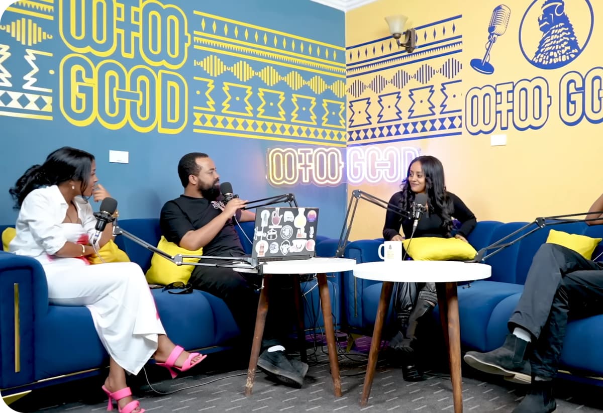 Podcast session with guests on blue couch
